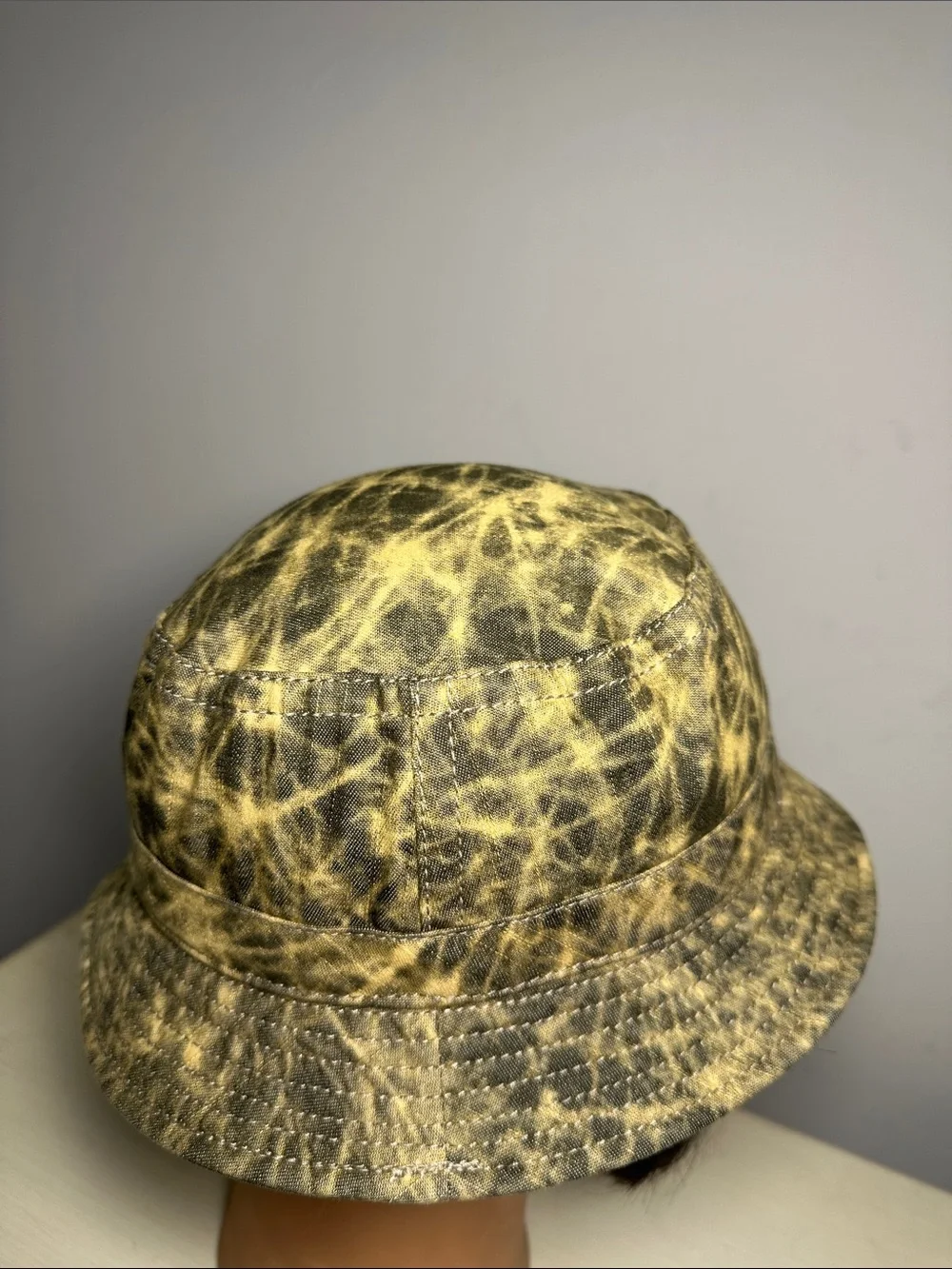 Kangol weathered canvas Yellow and Gray all over print Bucket Hat